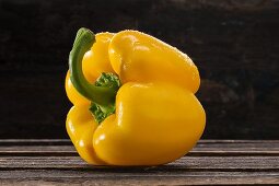 Yellow pepper with drops of water