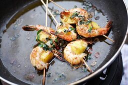 Prawn skewers with pineapple and wild garlic