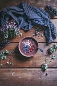 Chocolate smoothie bowl with Brazil nuts, goji berries and cacao nibs