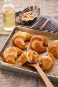 Stuffed ham and cheese croissants made from quark oil dough