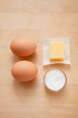 Eggs, butter and salt - ingredients for fried eggs