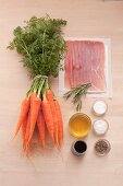Ingredients for carrots wrapped in parma ham