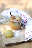 A small pear cake in a glass jar