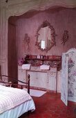 Vintage twin washstand in bedroom behind screen
