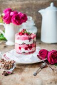 Rose water parfait with cereal and raspberries
