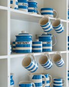 Collection of blue and white crockery in dresser