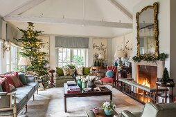 Festive English-style living room with open fireplace