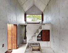 Purist, modern architect-designed house made from wood and concrete
