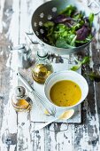 Homemade vinaigrette and lettuce