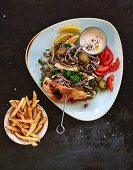 Shawarma in pita bread with a dip and French fries (Lebanon)