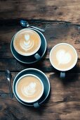 Latte art in cappuccinos