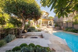 House view from the luxurious courtyard garden with pool