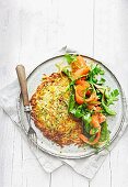 Asparagus and potato rosti with salmon and honey and lime dressing