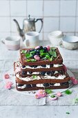 Black Forest-style blackberry cake with cherries
