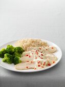Chicken breast fillets with Dijon mustard, broccoli, and rice