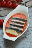 Marinated sardines in a serving bowl