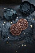 Vegan chocolate tartlets with oat pops