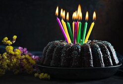 A vegan gugelhupf with birthday candles