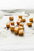 Still life of oven fried tofu and spices