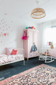 Girl's bedroom in pale pink