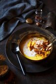 A coconut smoothie bowl with turmeric and mango