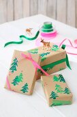 Gift wrapped in paper printed with Christmas trees