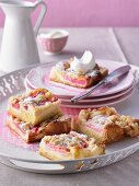 Rhubarb cake with icing sugar and cream