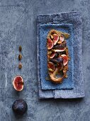 Ciabatta with figs, roasted pine nuts and honey