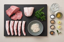 Ingredients for 'Weisswurst' (traditional Bavarian veal and pork sausage): pork, veal, meat from the calf's head, parsley, pork casing and spices
