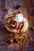 A flaky pastry rose with plums