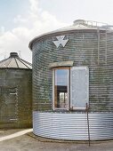 Window in façade of converted silo