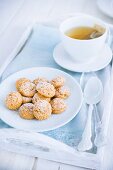 Amaretti biscuits and a teacup