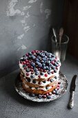 Layer cake with berries and cream