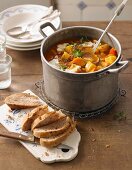 Potato goulash with pumpkin and walnut bread