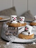 Snowman biscuits with marshmallows