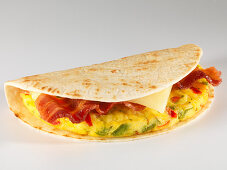 An omelette, bacon and cheese taco