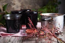 Homemade elderberry jelly in glass jars