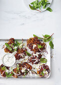 Spiced carrot and beetroot fritters with mint and apple yoghurt