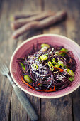 Purple carrot noodles with sesame seeds