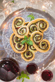 Palmiers with smoked ham, basil and parmesan