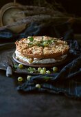 Vegan gooseberry and cream cake with almond and quinoa topping