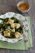 Gnocchi with stinging nettle and flaked almonds