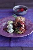 Pork tenderloin with elderberry sauce and poppy seed and potato dumplings