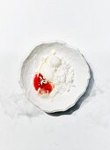 Milk crumbs with yoghurt and orange blossom ice cream, strawberries, lime and white chocolate