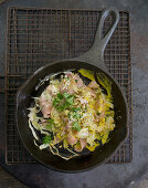 Scrambled eggs with ham, pointed cabbage and parsley