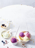 Different flavours of ice cream and fresh berries