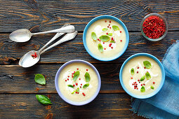 Celery and leek soup with mustard, red pepper and basil