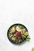 Lamb with olive and cauliflower pilaf