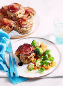 Mini chicken meatloaf with cocktail tomatoes