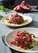 Oriental beef tartare with pomegranate seeds